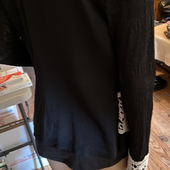 Gorgeous black sweater top with white lace embellishments. - Picture 6 of 6